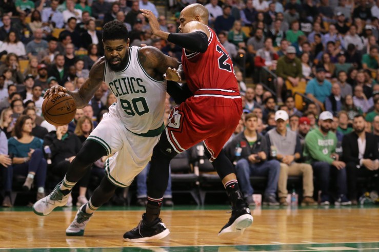 BOSTON, MA - NOVEMBER 2: Amir Johnson #90 of the Boston Celtics drives against Taj Gibson #22 of the Chicago Bulls during the third quarter at TD Garden on November 2, 2016 in Boston, Massachusetts. (Photo by Maddie Meyer/Getty Images)